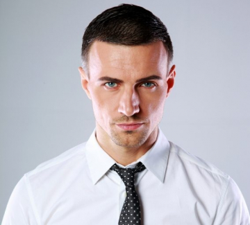 demo-attachment-448-portrait-of-a-confident-man-over-gray-background-PDL3Q9F
